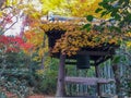 Charming scene of colorful autumn trees with bell tower in japanese temple for background Royalty Free Stock Photo