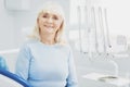 Charming senior woman paying visit to dentist Royalty Free Stock Photo