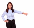 Charming senior woman pointing to her left Royalty Free Stock Photo