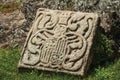 Charming and shabby family coat of arms carved on stone