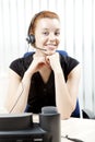 Charming smiling woman with a headset Royalty Free Stock Photo