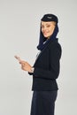 charming stewardess in arabian airlines uniform Royalty Free Stock Photo