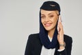 charming stewardess in arabian airlines uniform Royalty Free Stock Photo