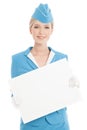 Charming Stewardess In Blue Uniform With Blank Form On White