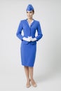Charming Stewardess Dressed In Blue Uniform Royalty Free Stock Photo