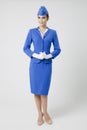 Charming Stewardess Dressed In Blue Uniform