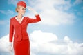 Charming Stewardess Dressed In Red Uniform. Royalty Free Stock Photo