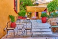 Street cafe on the stairs in Plaka in Athens Royalty Free Stock Photo