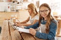 Charming teenage girl planning her next working day Royalty Free Stock Photo