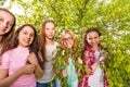 Charming teenage girls standing in the forest Royalty Free Stock Photo