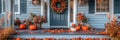 A charming Thanksgiving themed front porch with pumpkins, wreaths, and seasonal flowers Royalty Free Stock Photo