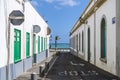 Traditional street with whitewashed houses and colorful windows and doors in Arrecife, Lanzarote, Canary Islands, Spain Royalty Free Stock Photo