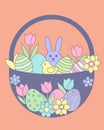 Cute Easter Basket with Bunny, Chick, Eggs, and Spring Flowers Royalty Free Stock Photo