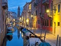 Charming view of canal and traditional gondolas in Venice, Italy