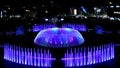 Charming view of Downtown Bucharest fountains with night illumination, Romania