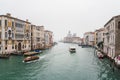 Charming view of Venice, Italy by the grand canal on a foggy morning