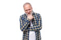 charming well-groomed senior pensioner gray-haired man with a beard in a shirt Royalty Free Stock Photo