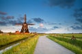 Charming windmill in morning sunshine