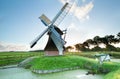 Charming windmill at sunrise in Netherlands