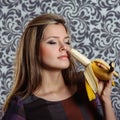 Charming woman with banana Royalty Free Stock Photo
