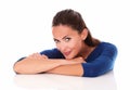 Charming woman looking at you with arms crossed Royalty Free Stock Photo