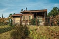 Countryside wood house with fence and garden Royalty Free Stock Photo