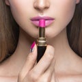 Charming young babe with lipstick and light makeup. Royalty Free Stock Photo