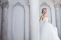 Charming young bride in luxurious wedding dress. Pretty girl, the photo Studio Royalty Free Stock Photo