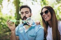 Charming young couple sitting on bench Royalty Free Stock Photo