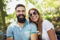 Charming young couple sitting on bench Royalty Free Stock Photo