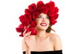 Charming young girl with red roses on head Royalty Free Stock Photo