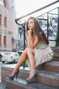 Charming young lady posing on the street Royalty Free Stock Photo