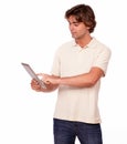 Charming young man working on tablet pc Royalty Free Stock Photo