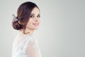 Charming young woman bride with makeup and bridal hairstyle. Pretty woman fiancee on white background with copy space Royalty Free Stock Photo