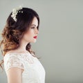 Charming young woman bride with wavy hairstyle