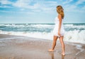 Charming young woman in a white dress Royalty Free Stock Photo