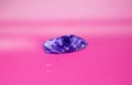 A charoite as tumbled gemstone and healing stone Royalty Free Stock Photo