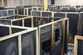 charred remains of office cubicles postfire