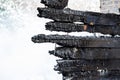 Charred wooden walls of a house after a fire. Burnt boards in a burnt down building Royalty Free Stock Photo