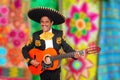 Charro Mariachi playing guitar serape poncho Royalty Free Stock Photo