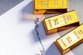 Top view of gold bars and chart growth price of gold Royalty Free Stock Photo