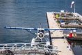 Charter air planes. Harbour Air float plane docked in Coal Harbour in Vancouver British Columbia Canada - September 28,2019 Royalty Free Stock Photo