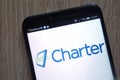 Charter Communications logo displayed on a modern smartphone