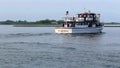 Charter fishing boat the JIB VI leaving Captree Boat Basin for a night of fishing