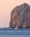 Charter and fishing boats leaving the Cabo marina just after sunrise heading toward Lands End and the Arch Royalty Free Stock Photo