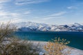 Charvak reservoir near Tashkent in the mountains in winter Royalty Free Stock Photo