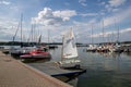 Charzykowy, Pomeranian Voivodeship / Poland - July 20, 2019: Marina and moored sailboats at the lake harbor. Sailing port in