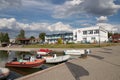 Charzykowy, Pomeranian Voivodeship / Poland - July 20, 2019: Marina and moored sailboats at the lake harbor. Sailing port in