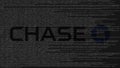 JPMorgan Chase Bank logo made of source code on computer screen. Editorial 3D rendering