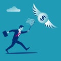 Chasing money concept. Businessman trying to catch flying coin. Royalty Free Stock Photo